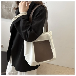 Canvas tote bag in beige and brown with side pocket and long shoulder straps