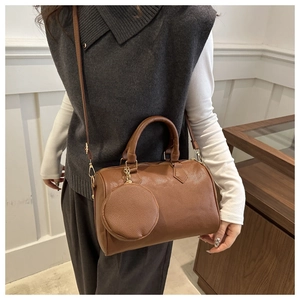 Brown Boston shoulder bag with lychee grain texture and a mini coin purse pendant