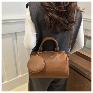 Brown Boston bag with matching round coin purse detail and detachable shoulder strap