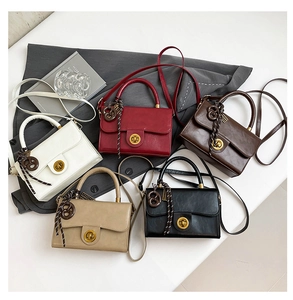 Collection of vintage mini PU leather crossbody bags in four retro colors with gold hardware