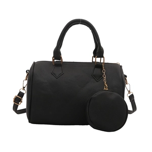 Classic black Boston handbag in litchi grain leather with gold hardware and coin purse