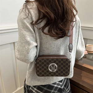 Retro brown camera bag with M-letter pattern and adjustable wide shoulder strap