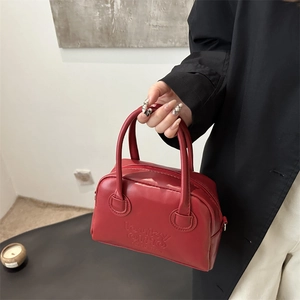 Red retro bowling handbag with embossed letters and double handles for women