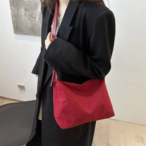 Minimalist deep red suede shoulder bag with retro design for women in casual chic style