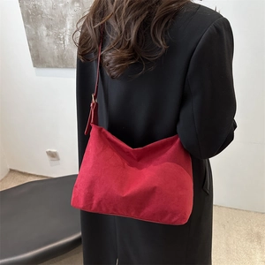 Minimalist deep red suede shoulder bag with thin leather strap for women city style