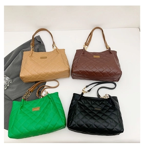 Quilted tote bags in beige, brown, green, and black with fashion gold chain straps