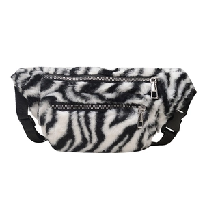 Stylish zebra print plush waist bag with adjustable strap and dual zipper pockets