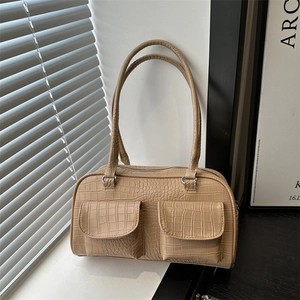 Retro crocodile embossed Boston handbag in beige with double pockets and long handles