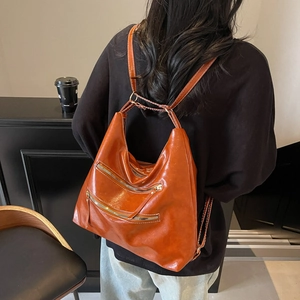 Sac à dos Hobo rétro en cuir PU caramel avec poches zippées et bandoulières réglables