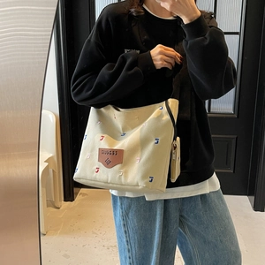 Large off-white canvas tote bag with colorful J-embroidery and mini pouch