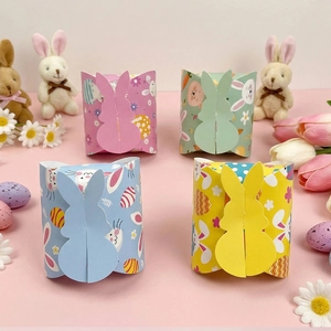 Detailed view of colorful Easter bunny gift boxes with egg and floral pattern decorations