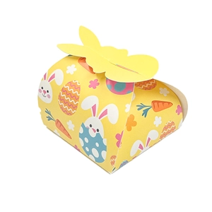 Yellow Easter paper gift box featuring cartoon bunnies and eggs with a folding bunny ear lid