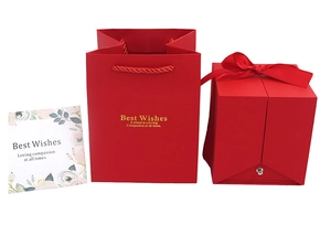 Red double-door jewelry gift box set with matching ribbon bag and greeting card