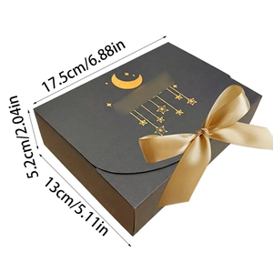 Black rectangular gift box with gold foil moon star design and satin ribbon bow