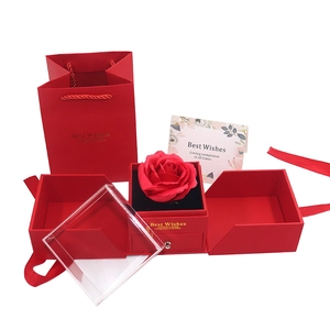 Elegant red double-door jewelry gift box with preserved rose, drawer, and matching tote bag