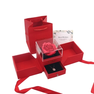 Red double door jewelry gift box with preserved rose necklace and matching handbag