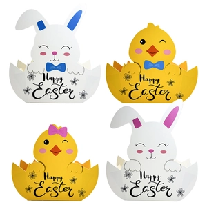 Detail of bunny and chick paper egg baskets with Happy Easter print and bow accents