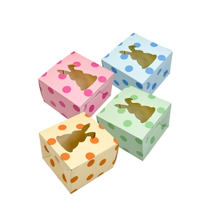Polka dot Easter gift boxes with rabbit window in pink, blue, green and yellow colors