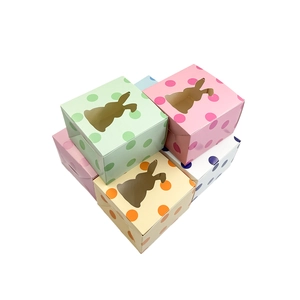 Easter treat boxes with colorful dots and a rabbit-shaped window for candy packing