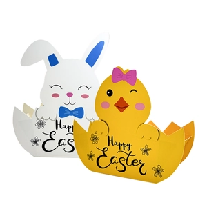 Detailed view of paper Easter baskets with cute bunny and chick designs for party candy