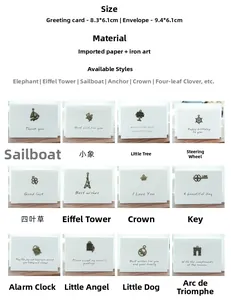 Mini vintage greeting card set with metal charms like sailboat, elephant, and crown icons