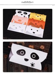 Close-up of cute cartoon animal envelopes featuring panda and fox designs for kids