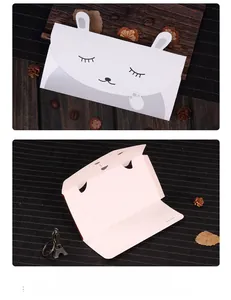 Detailed view of cute animal card with folded ears and inner lined paper for gift messages