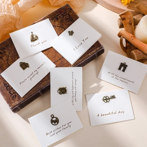 Retro mini greeting card set with vintage bronze charms and warm English blessings