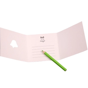 Pink Christmas greeting card featuring bell cutout and lined space for personalized messages