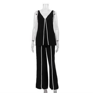 Dames tweedelige set met mouwloze V-hals top en rechte broek met contrast biesjes