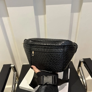 Classic black woven leather chest bag with gold zipper and adjustable wide strap