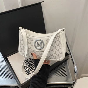 White monogram crescent shoulder bag with silver M logo hardware and luxury gift box