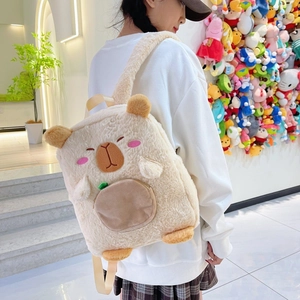 Detail view of a fluffy Capybara plush backpack with adjustable straps and soft texture