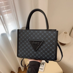 Large capacity floral tote bag with black leather handles and crossbody strap