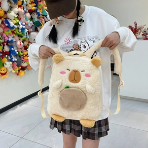 Detailed view of Capybara plush backpack with soft beige fur and brown front pocket