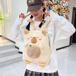Detail of cute Capybara plush backpack with embroidery and brown zip pocket