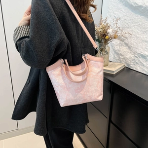 Pink jacquard silk tote bag with floral texture and leather handles for fashion women