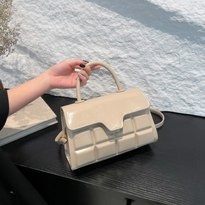 Cream 3D square embossed shoulder bag with adjustable strap and top handle design