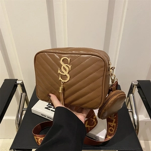 Quilted crossbody bag in brown leather with V-stitching and letter strap for women