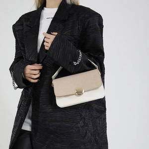 French retro contrast handbag with cream leather and khaki woven flap and gold buckle