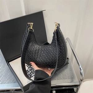 Fashionable black woven crescent underarm bag with gold metal hardware for women