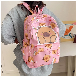 Close-up of pink backpack featuring cute capybara embroidery and waterproof material