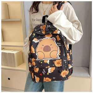 Detail view of the black Capybara print backpack with adjustable straps and large capacity