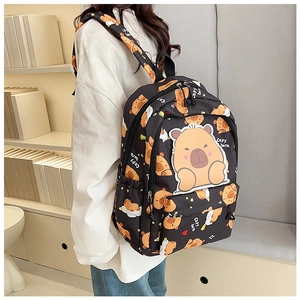 Detail of cute Capybara cartoon backpack showing side pocket and printed canvas texture