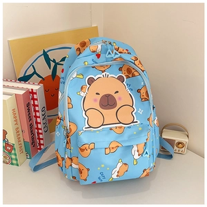 Detail of light blue school backpack featuring cute capybara patterns and front pocket