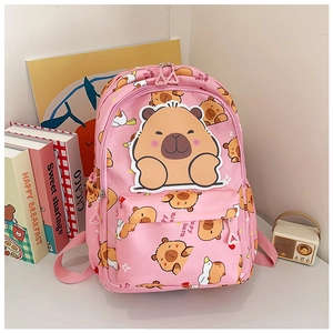 Close-up of pink backpack with Capybara cartoon embroidery and large front pocket