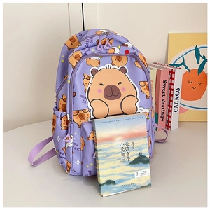 Close-up of the purple capybara backpack featuring durable fabric and multi-pocket design