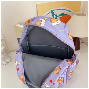 Interior view of a purple cartoon capybara backpack with a spacious main compartment.