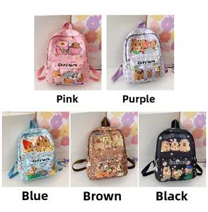 Detail showing five different colors of cartoon Capybara themed school backpacks for kids