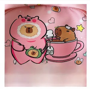 Macro shot of cute cartoon capybara print and BARA text on pink children backpack fabric